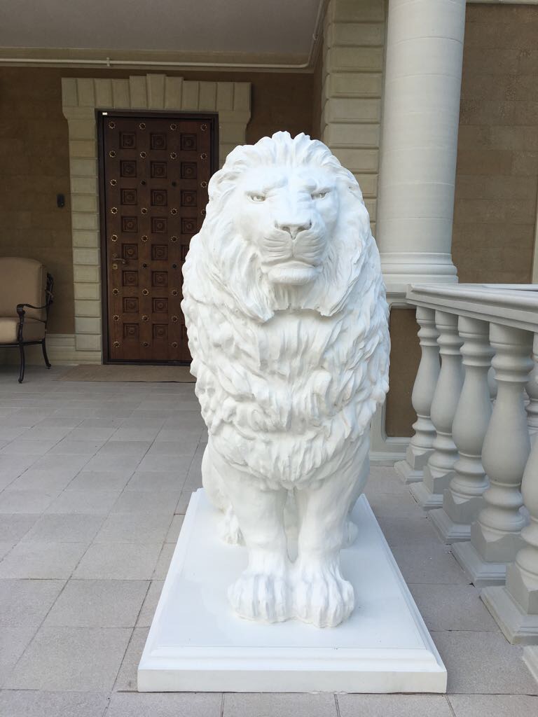 садовая скульптура льва
